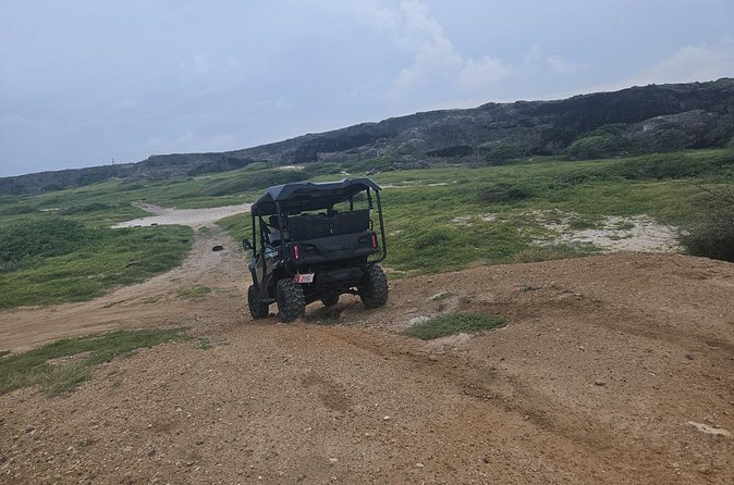 5-seater UTV 4 Hours Island tour in Aruba - Stop 4: Cave Pool Aruba for a natural water break (bring goggles)