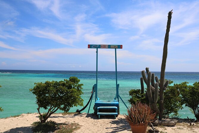 Art, Beach and Culture Island Tour with Kini Kini - The Red Anchor Tribute: A Pause That Adds Meaning
