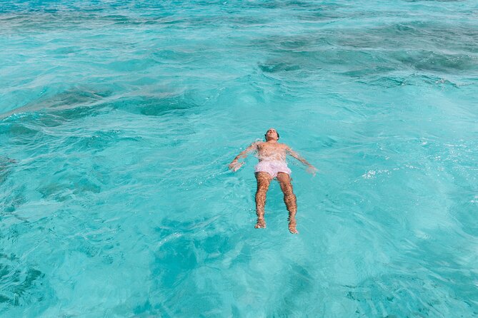 Custom Full‑Day Private Adventure: Snorkel & Explore Hidden Spots - Stop at Mangel Halto Beach: snorkel time with expert guidance