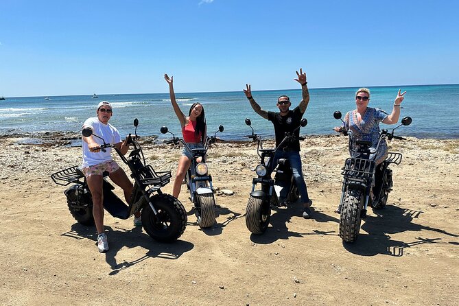 Electric Scooter Island Tour in Aruba (1 or 2-seater) - Malmok Beach: clear shallow water and snorkeling-friendly vibes