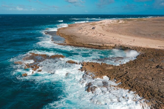 Full day Aruba Island Private Jeep Tour Arikok Park - Drone Shots - Oranjestad plus classic sights: color, colonial lines, and a slow stroll feel
