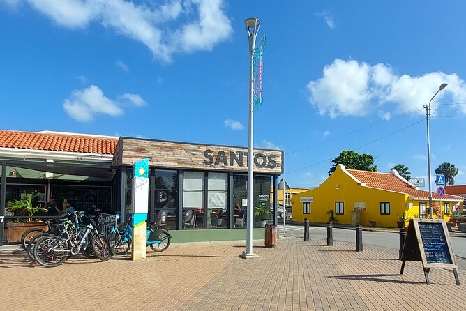 Oranjestad Culture Heritage and Coastal Electric Bike Experience - Meeting at Stezo and Rolling Through Bubali Plas