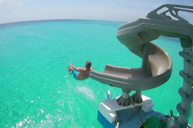 Private Catamaran Adventure Cruise with Rope Swing and Water Slide - Boca Catalina Bay reef snorkeling: shallow water, fish, and easy momentum