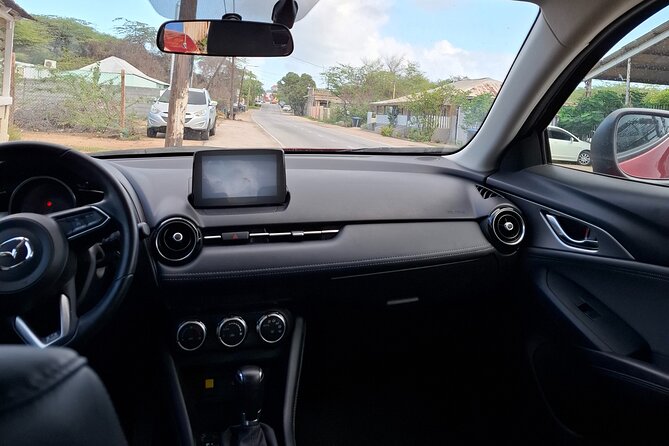 Private Pick Up or Drop Off in Aruba - The ride itself: AC, Wi‑Fi, water, and calm driving