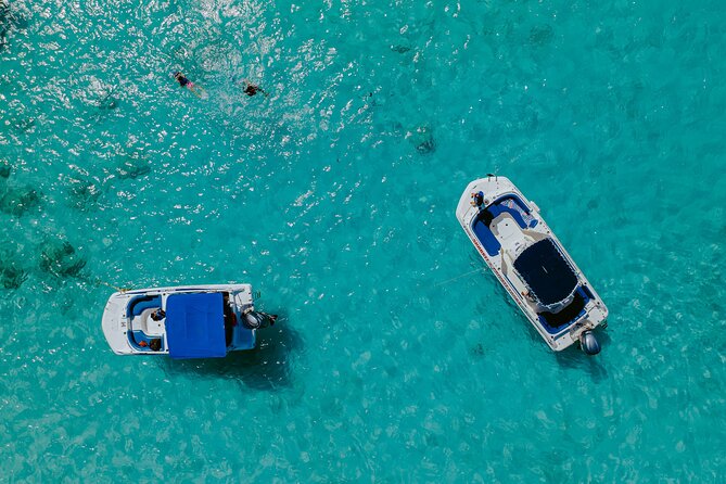 Private Snorkeling and Boat Riding Experience in Aruba - Gear on board: snorkeling equipment plus an underwater scooter